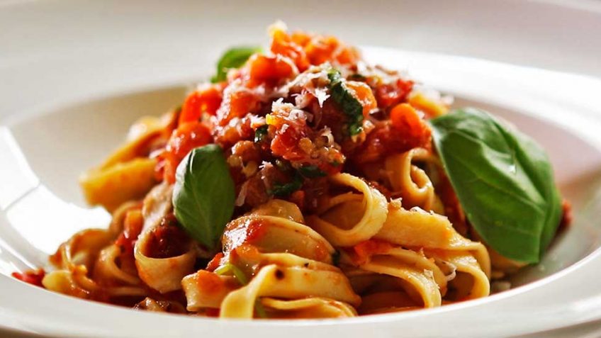 Fresh tomato and basil with freshly made fettuccine pasta